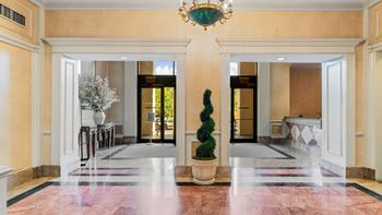 A hallway with a chandelier at one west,  new york,10004,